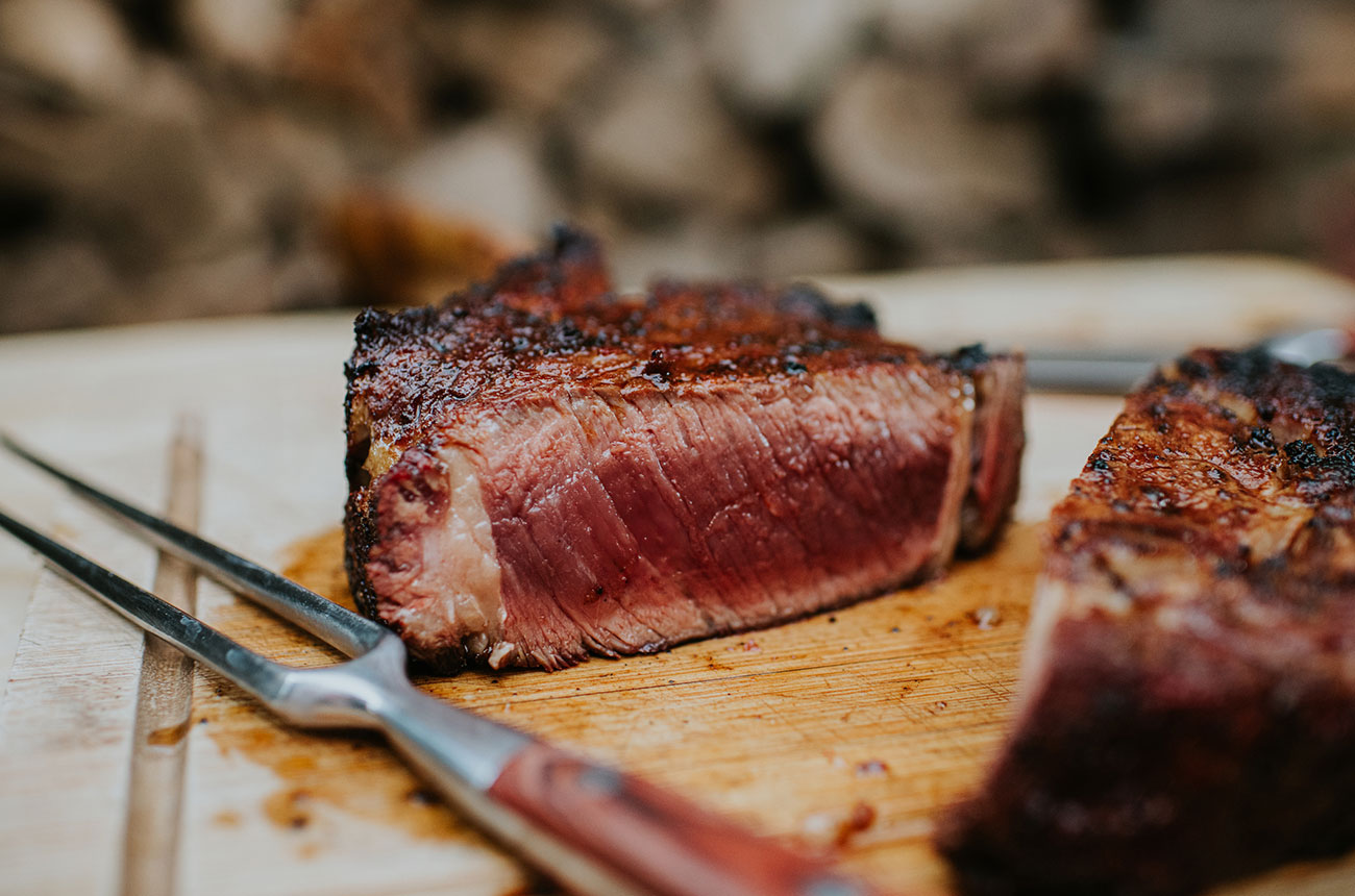 tomahawk beef rib cooked on bbq