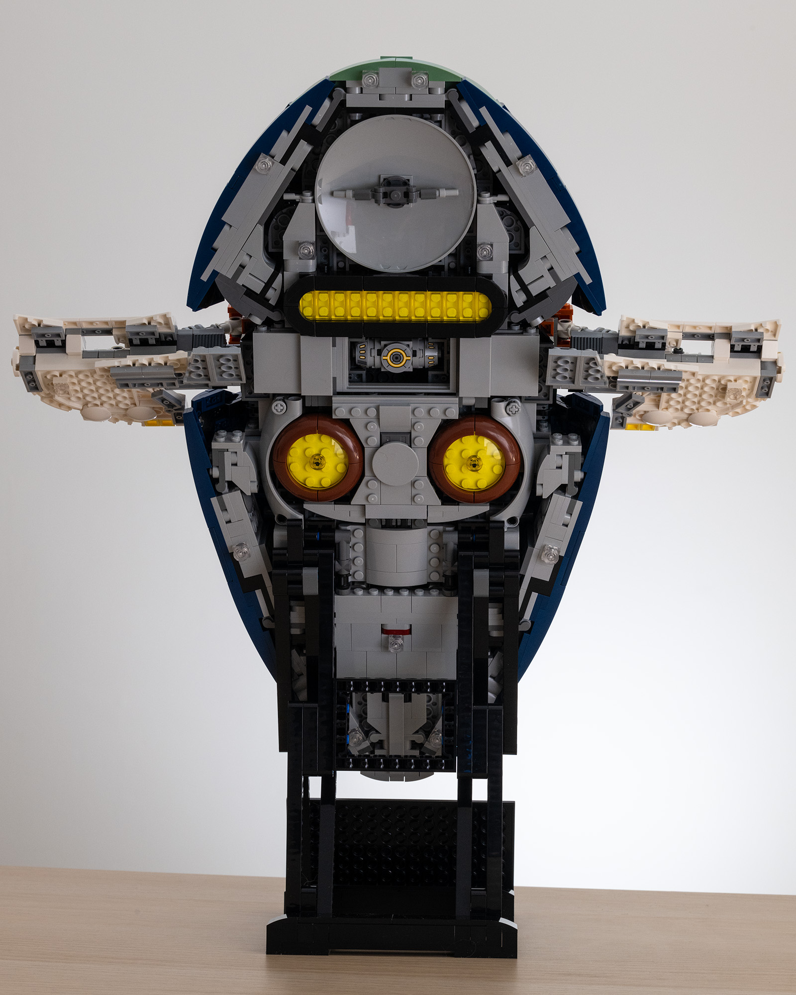 Lego Star Wars UCS Jango Fett&rsquo;s Firespray-Class Starship (75409) on a table with a white background rear image