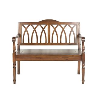 A brown wooden bench with a detailed arch lattice pattern on the back