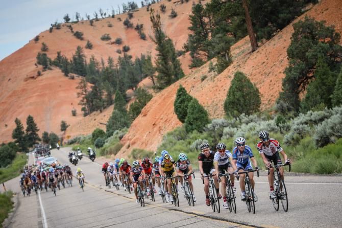 The field starts to split after attacks go on the first climb