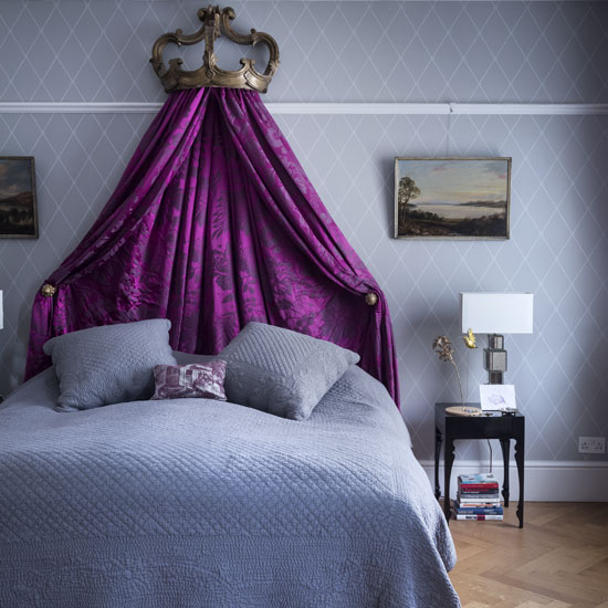 bedroom with grey wall and wooden flooring