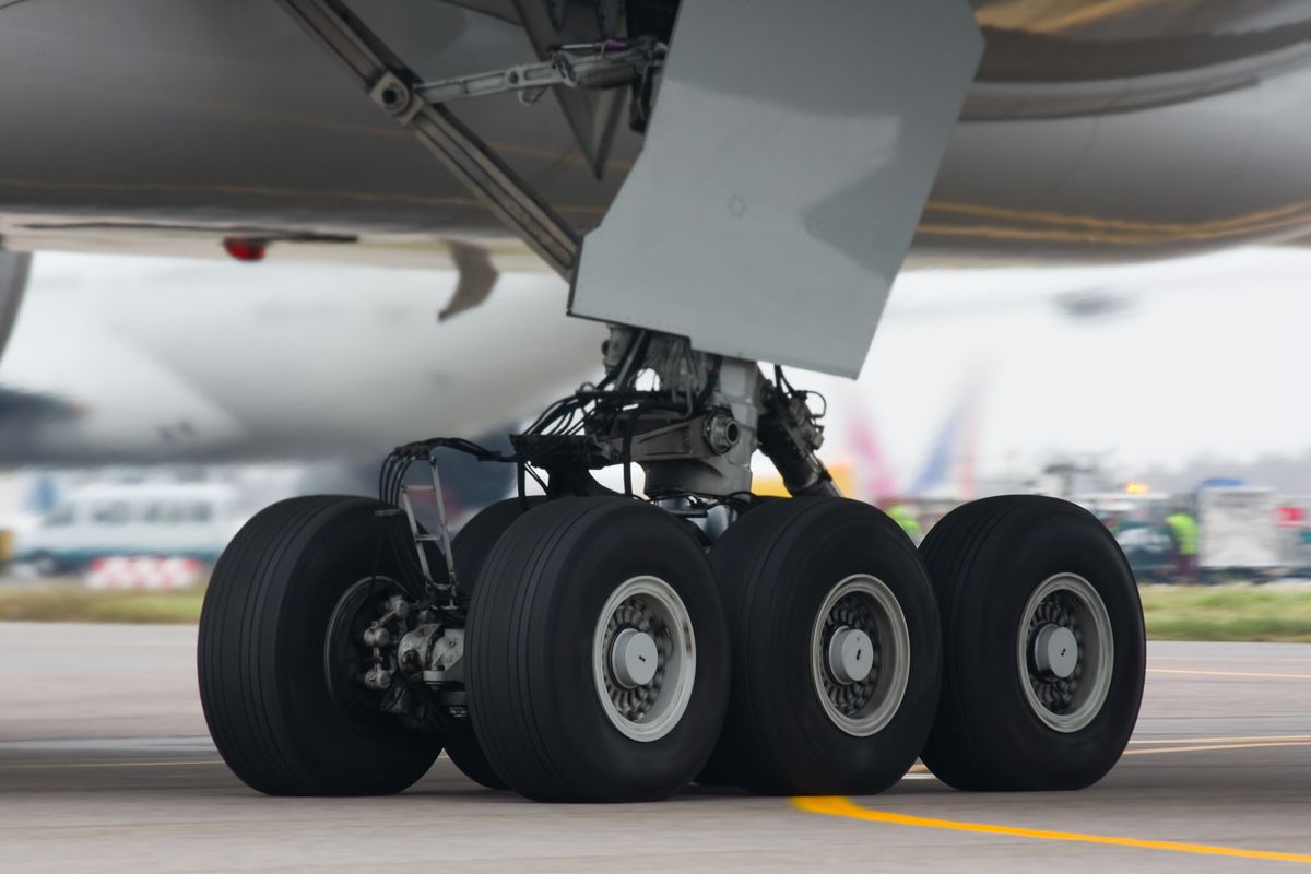 Wheel-well stowaways board planes by climbing the landing gear of a plane preparing for takeoff. Seen here is the landing gear of a Boeing 777.