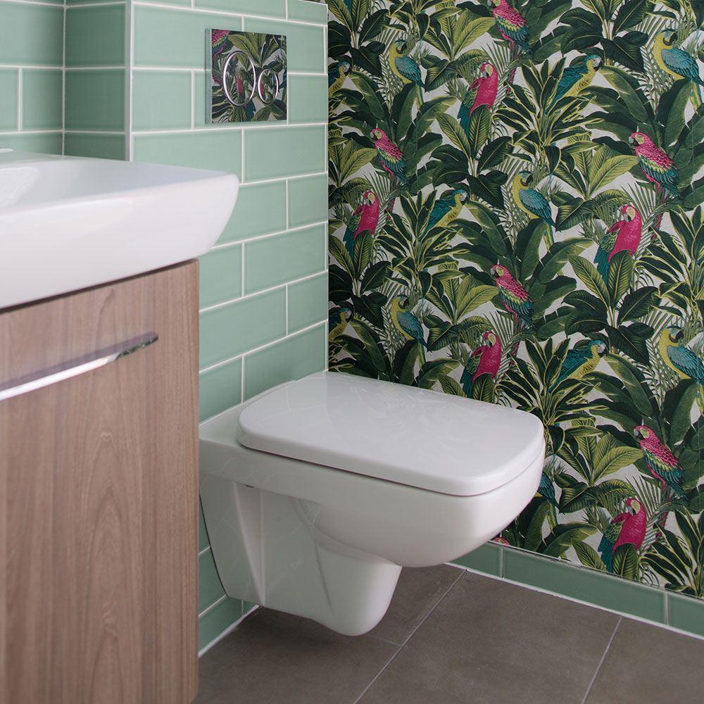 Green bathroom makeover with tropical wallpaper | Ideal Home