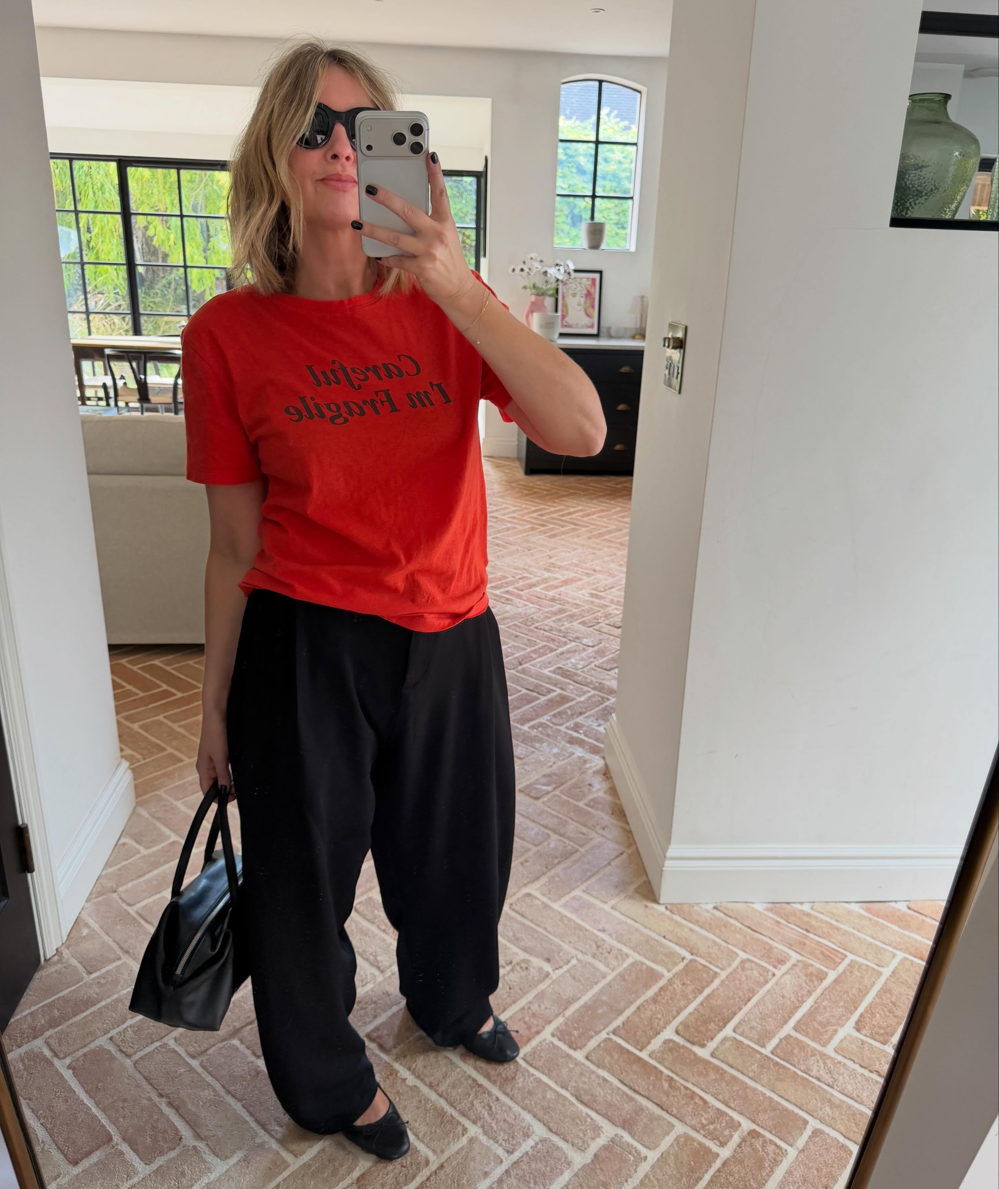 Emma Rose Thatcher wears Slogan Tee + Baggy Trousers + Ballet Flats