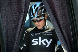 Chris Froome emerges from the Sky bus for a training ride