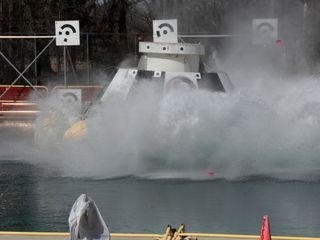 The Boeing CST-100 Starliner crew capsule undergoes a water-landing test.
