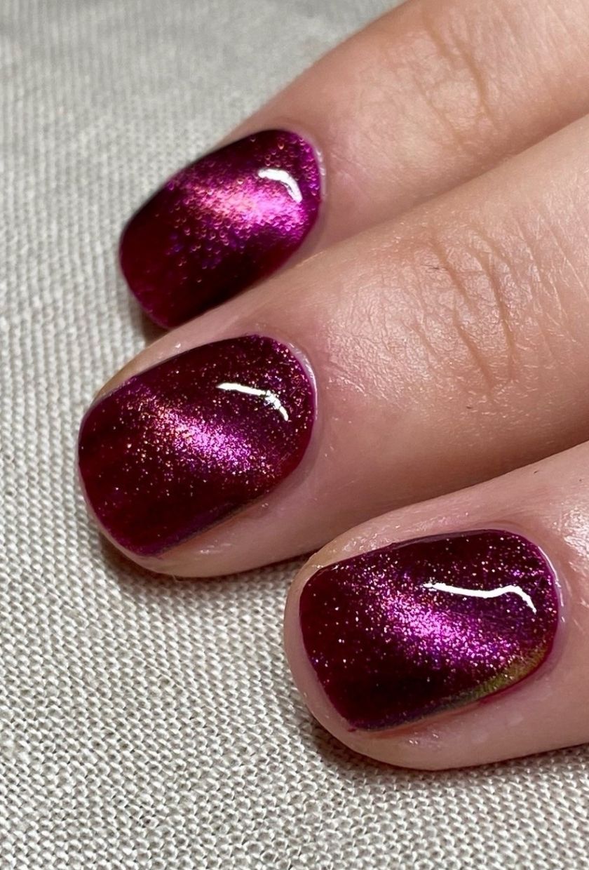 a close-up shot of purple velvet nails