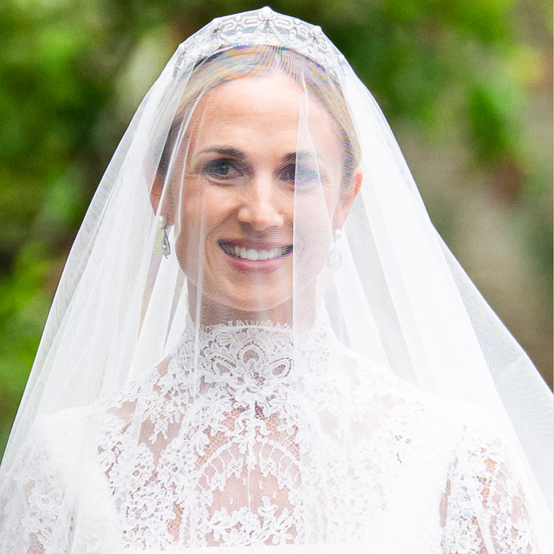 Harriet Sperling wearing a veil and wedding dress