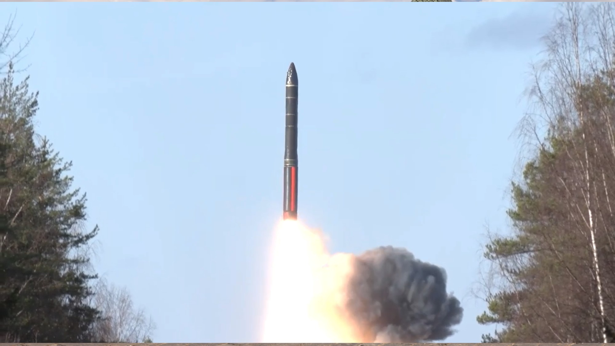 A missile launching in woodland