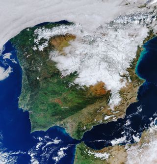 In this view from space captured by the Copernicus Sentinel-3 satellite, you can see a heavy blanket of snowfall over much of Spain. The image, snapped at 5:40 a.m. EST (1040 GMT) on Jan. 12, shows most of the country covered in snow following storm Filomena, which brought the heaviest snowfall that Spain has seen for 50 years. Copernicus Sentinel-3 is a two-satellite mission that, with a variety of instruments, observes and monitors Earth's surface from above.