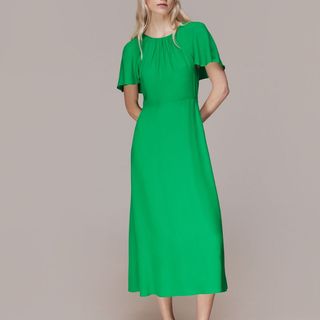 green cape sleeve dress