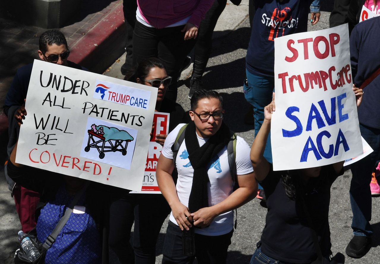 Protesters march towards the Federal Building during a &amp;#039;Save the Affordable Care Act&amp;#039; rally in Los Angeles, California on March 23, 2017. 