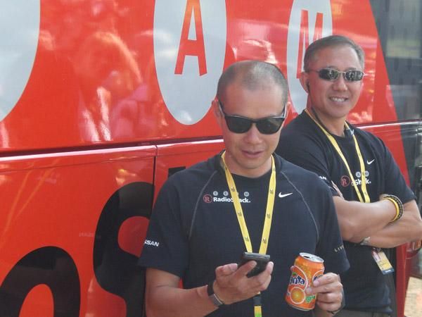 Radioshack's Allen Lim checks his messages
