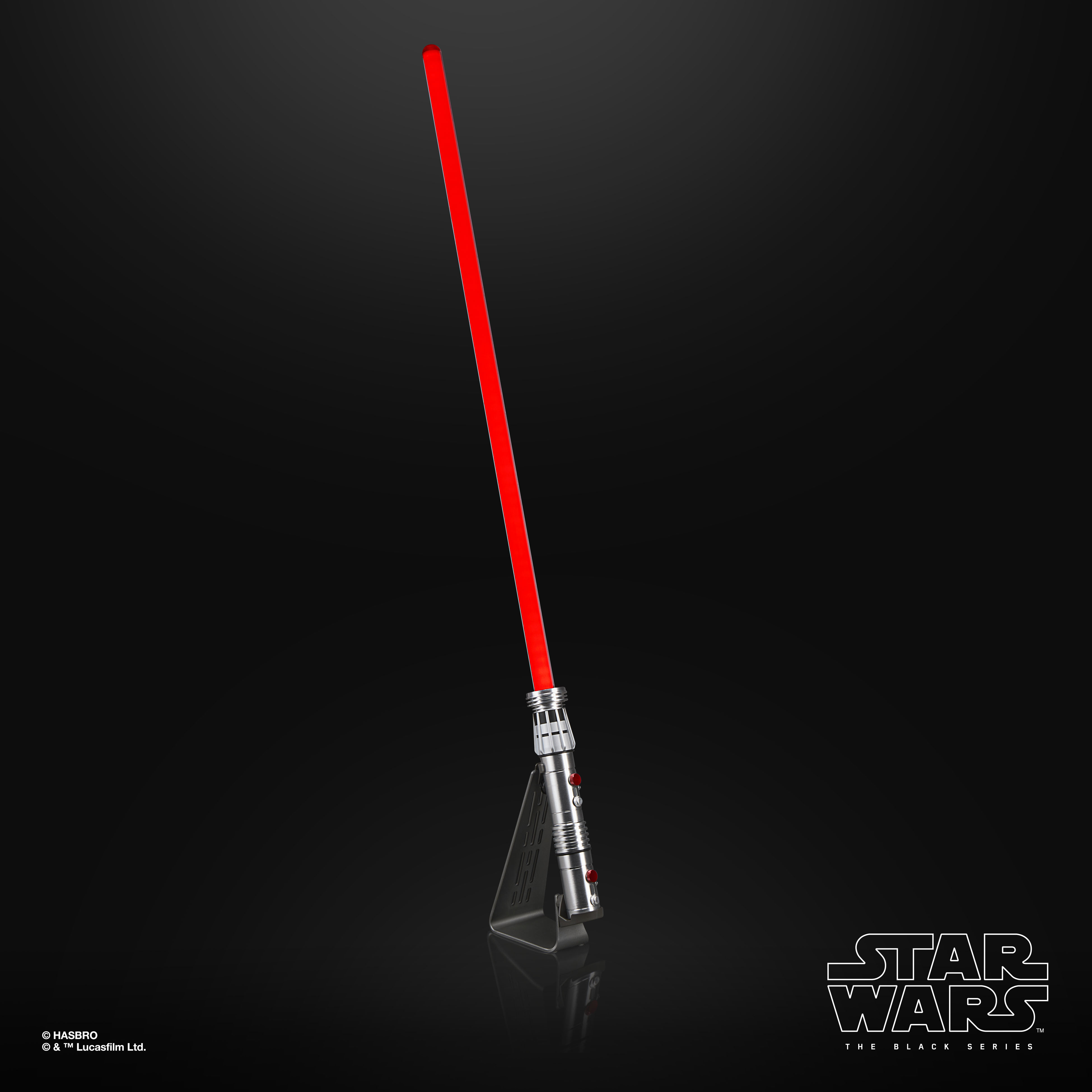 Star Wars The Black Series Force FX Elite Maul Lightsaber hilt and blade on a stand against a black background