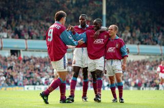 07 September 1996 - FA Premier League - Aston Villa v Arsenal - Savo Milosevic of Villa celebrates scoring a goal with team-mates Ugo Ehigu, Dwight Yorke and Alan Wright. (Photo by Mark Leech/Offside via Getty Images)