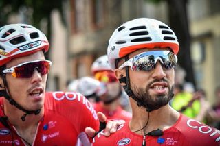 Christophe Laporte comes up to teammate Nacer Bouhanni after stage 1 of the Route d'Occitaine
