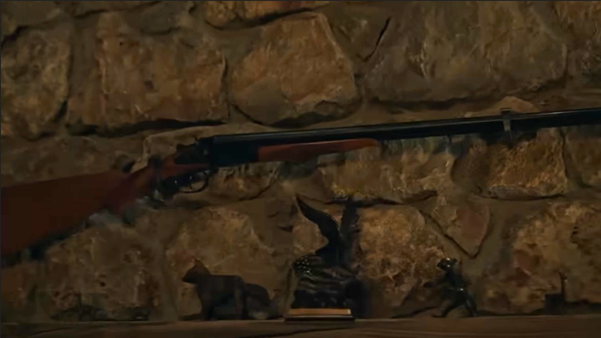 A shotgun on the wall in the Resident Evil movie