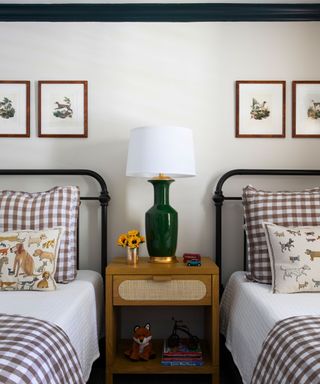 vintage twin bed kids bedroom with vintage art