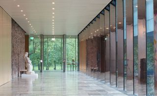 In the passage leading to an outside door at the Whitworth at the University of Manchester