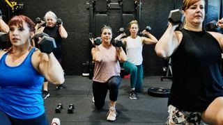 dumbbell-squat-gettyimages-1218068180