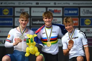 STIRLING SCOTLAND AUGUST 11 Silver medalist Ben Wiggins of The United Kingdom gold medalist Oscar Chamberlain of Australia and bronze medalist Louis Leidert of Germany pose on the podium during the medal ceremony after the Men Junior Individual Time Trial a 228km race from Stirling to Stirling at the 96th UCI Cycling World Championships Glasgow 2023 Day 9 UCIWT on August 11 2023 in Stirling Scotland Photo by Dario BelingheriGetty Images