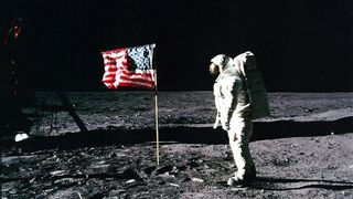 Apollo 11 astronaut Buzz Aldrin stands on the lunar surface during the first moon landing in 1969.