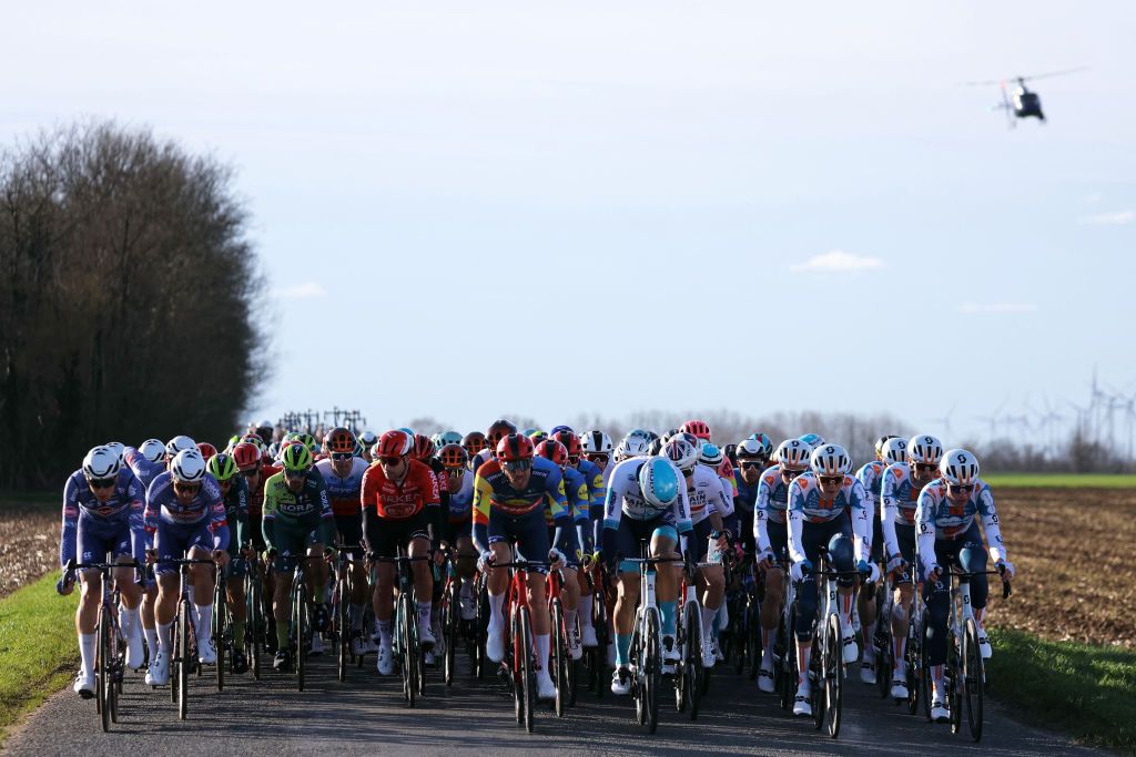 The pack rides during the 2nd stage of the Paris-Nice cycling race, 179 km between Thoiry and Montargis, on March 4, 2024. (Photo by Thomas SAMSON / AFP)