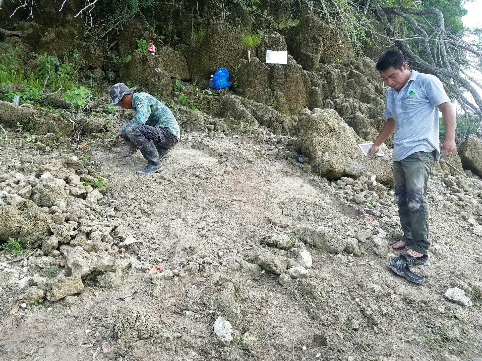 Metzabok community members, including Felipe Solorzano Solorzano, right, conduct excavations .