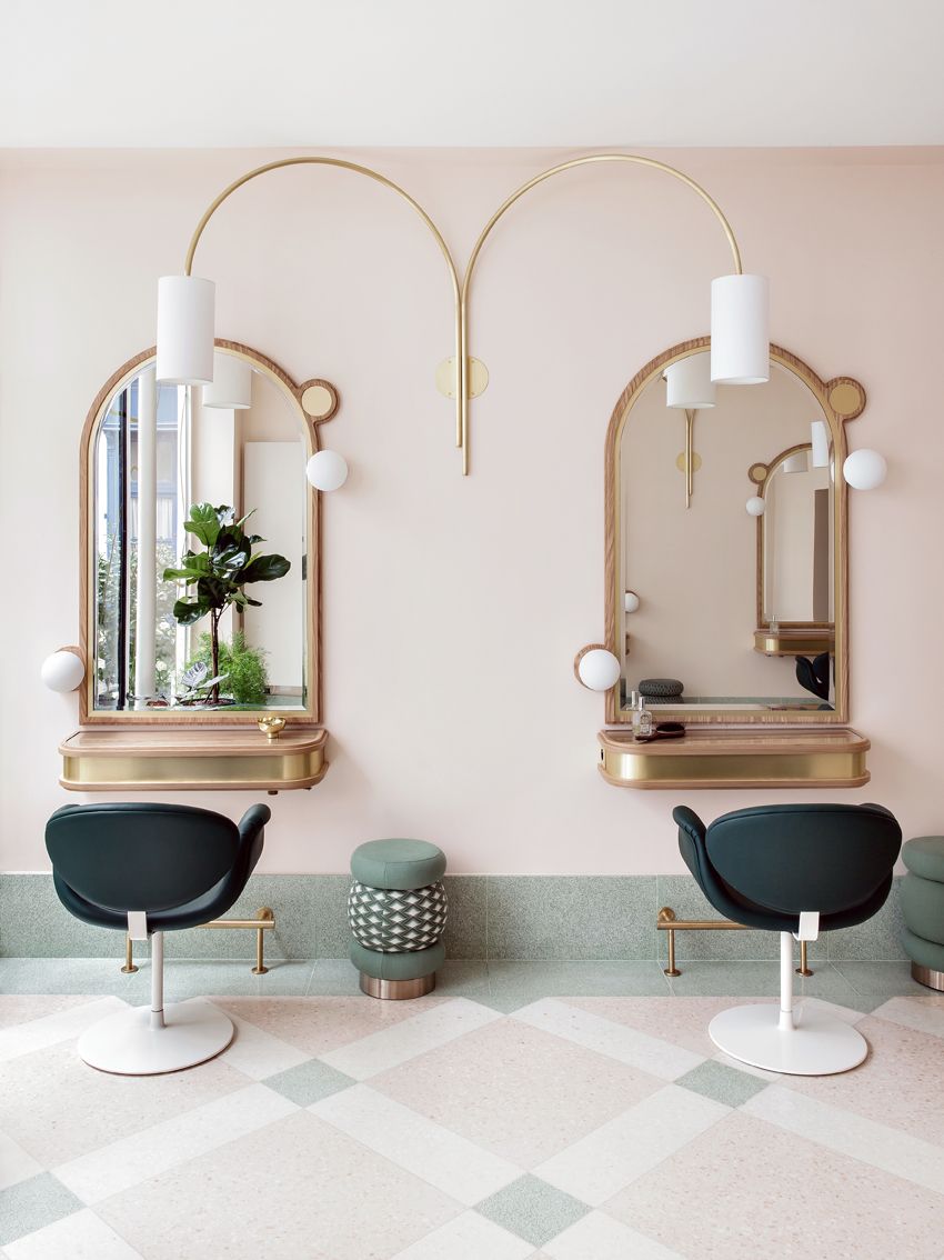 A hairdresser salon features whimsical, pastel-shaded art deco decor.