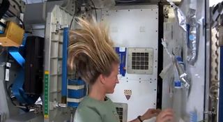 Astronaut Nyberg Washes Her Hair in Space