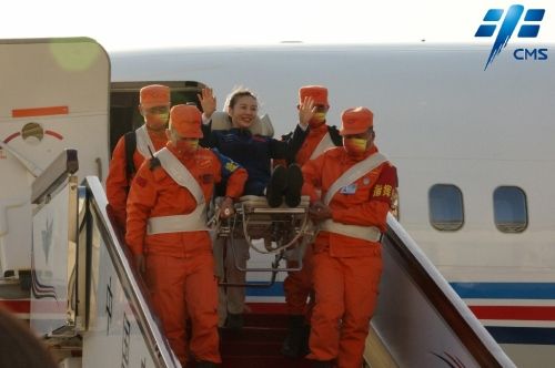 Chinese astronaut Wang Yaping waves while arriving in Beijing after returning to Earth on the Shenzhou 13 spacecraft on April 16, 2022 following a six-month mission to the Tiangong space station.