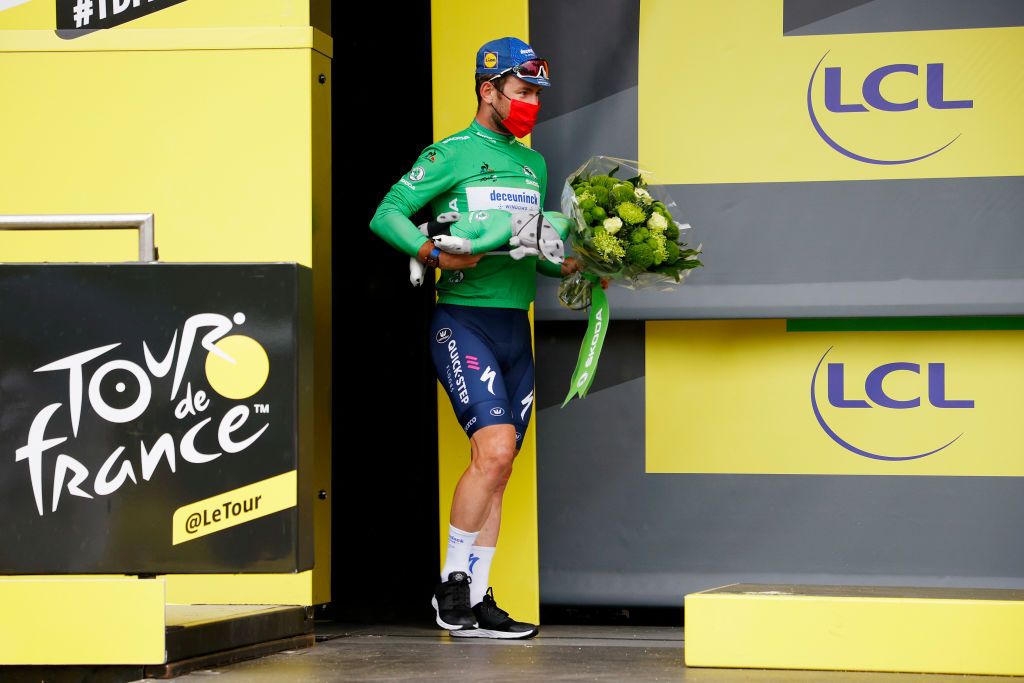 SAINTGAUDENS FRANCE JULY 13 Mark Cavendish of The United Kingdom and Team Deceuninck QuickStep Green Points Jersey celebrates at podium during the 108th Tour de France 2021 Stage 16 a 169km stage from Pas de la Casa to SaintGaudens LeTour TDF2021 on July 13 2021 in SaintGaudens France Photo by Chris GraythenGetty Images