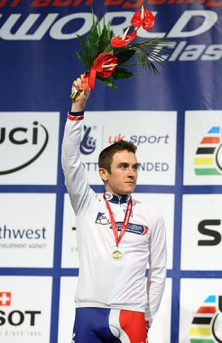 Geraint Thomas (Great Britain) on the podium with the gold medal after he won the men's 4000m individual pursuit.
