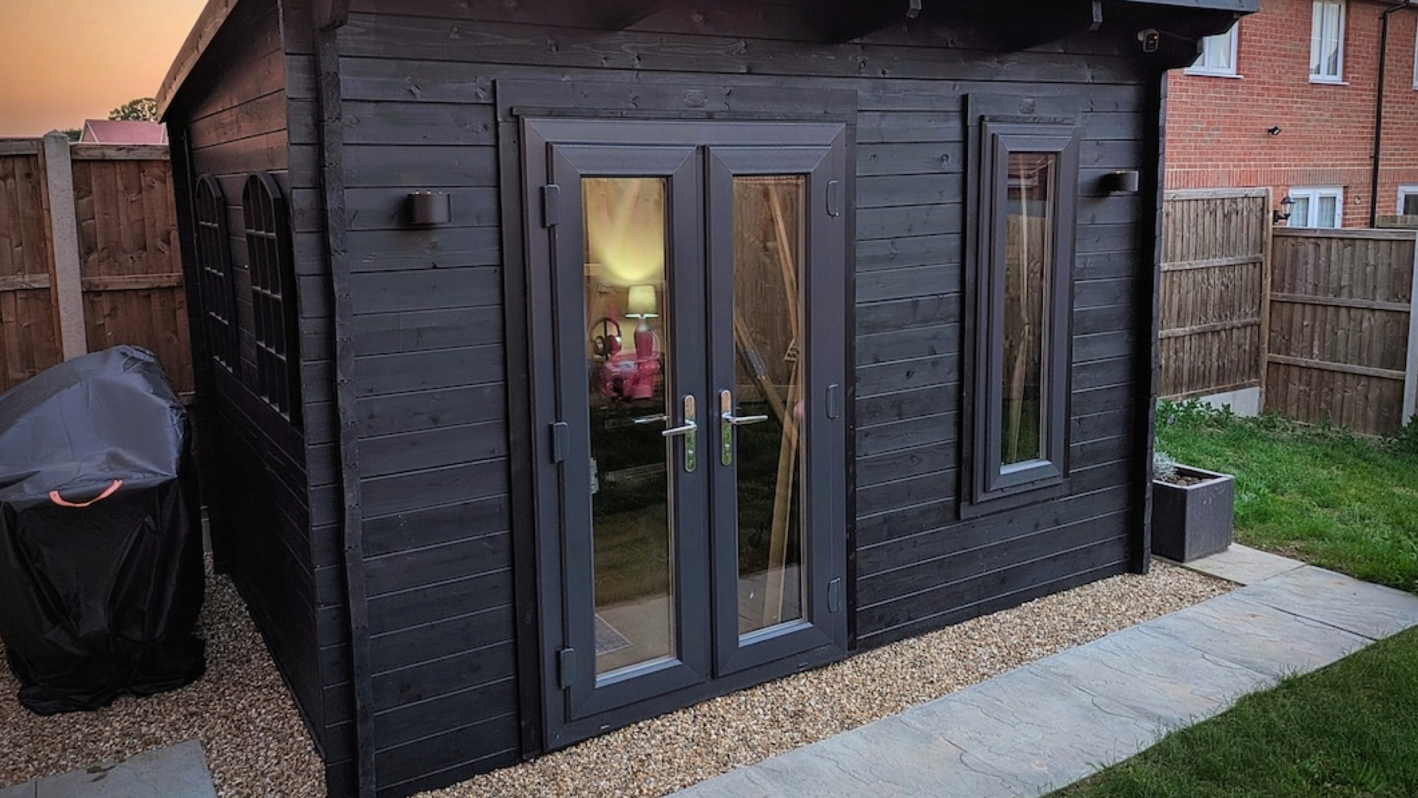 A photo of the exterior of Kurt Martinez's DIY Dolby Atmos garden studio