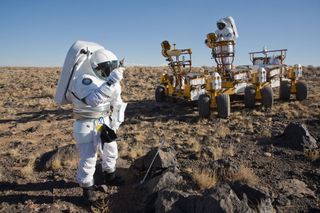 A NASA team practices techniques that could be used for astronauts on Mars. Sample return missions will help determine what sites on Mars can be safely visited.