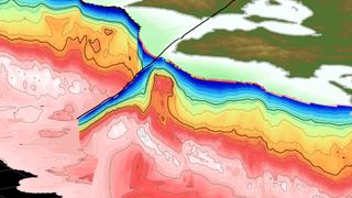 The Kumano Pluton in southern Japan appears as a red bulge (indicating dense rock) in the center of this new 3D visualization. The mountain-sized chunk of rock is nestled in the crust of the continental Eurasian plate, under which the oceanic Philippine plate is taking a dive toward the Earth's mantle.