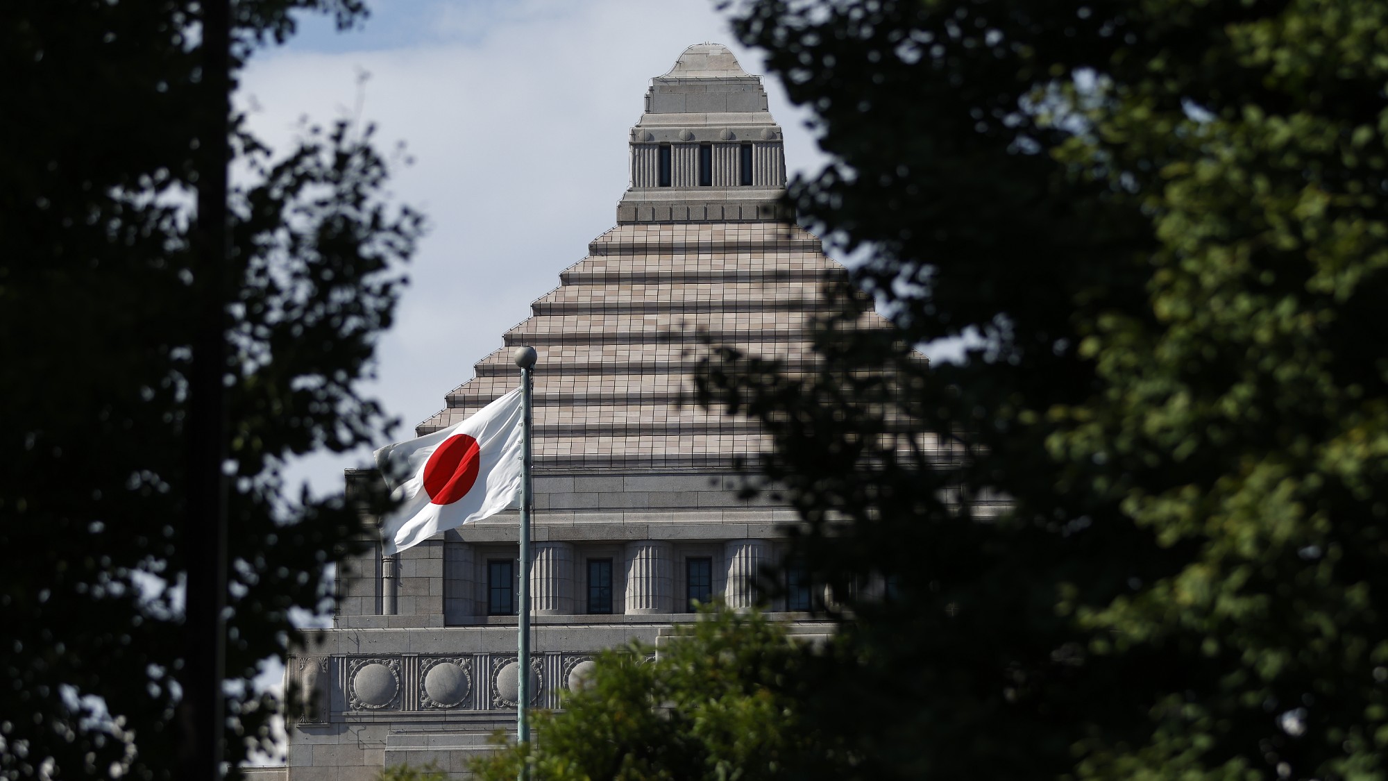 The Japanese flag flying in front of the National Diet building in Tokyo