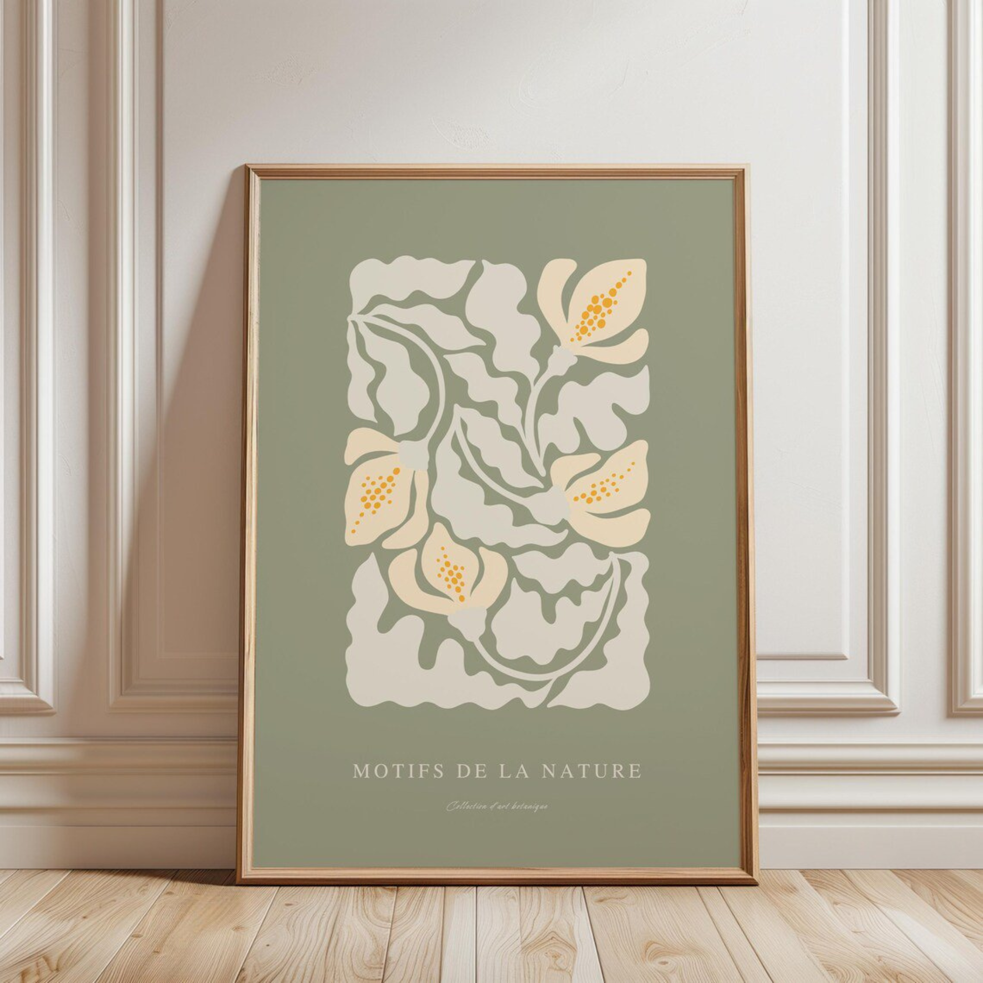A sage green floral print in a thin gold frame