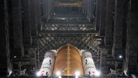 The base of NASA's Artemis 2 Space Launch System rocket is seen inside the Vehicle Assembly Building at NASA's Kennedy Space Center in Florida.