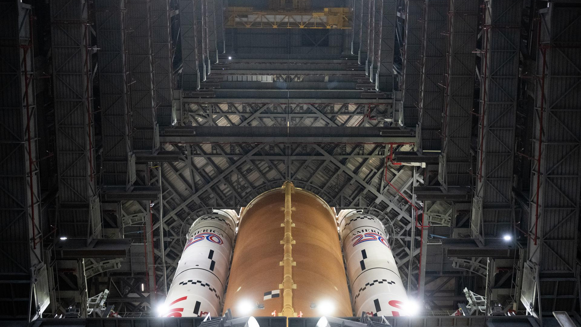 The base of NASA's Artemis 2 Space Launch System rocket is seen inside the Vehicle Assembly Building at NASA's Kennedy Space Center in Florida.