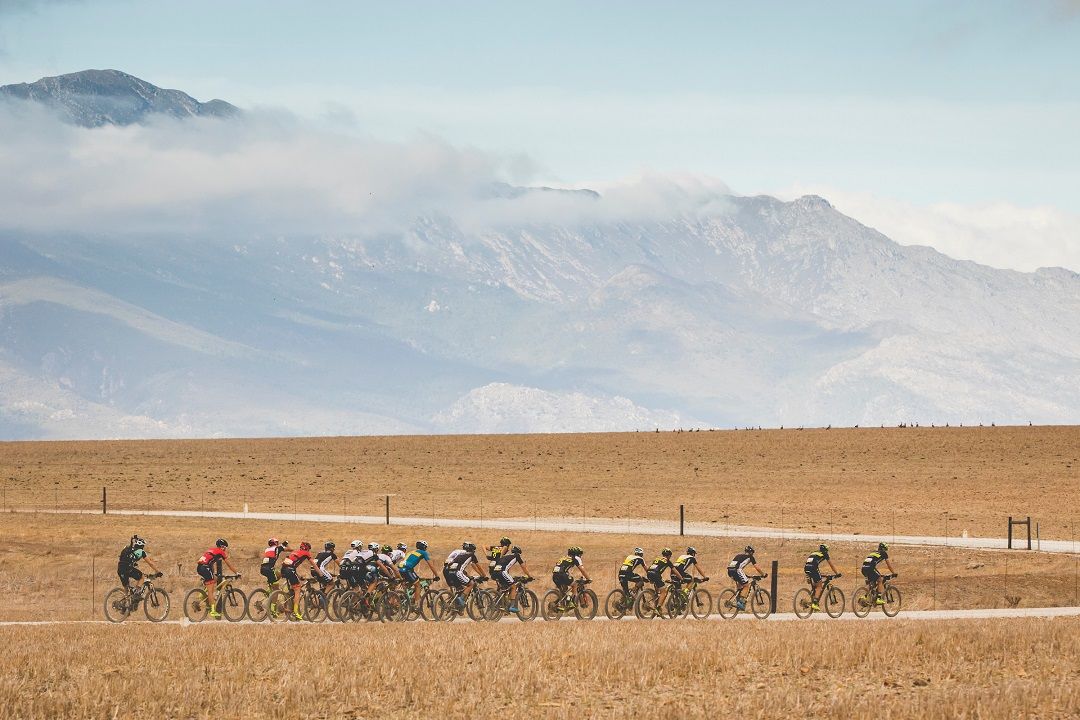 The riders on a rare flat section of the course