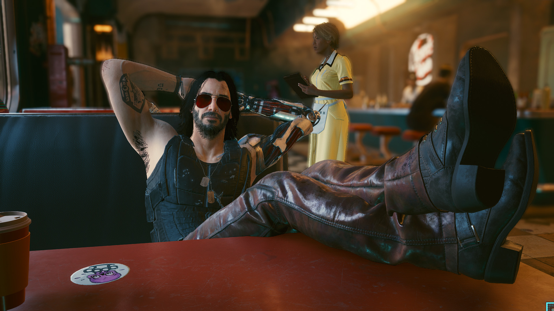 Johnny Silverhand in Cyberpunk 2077, kicked back at a diner table.