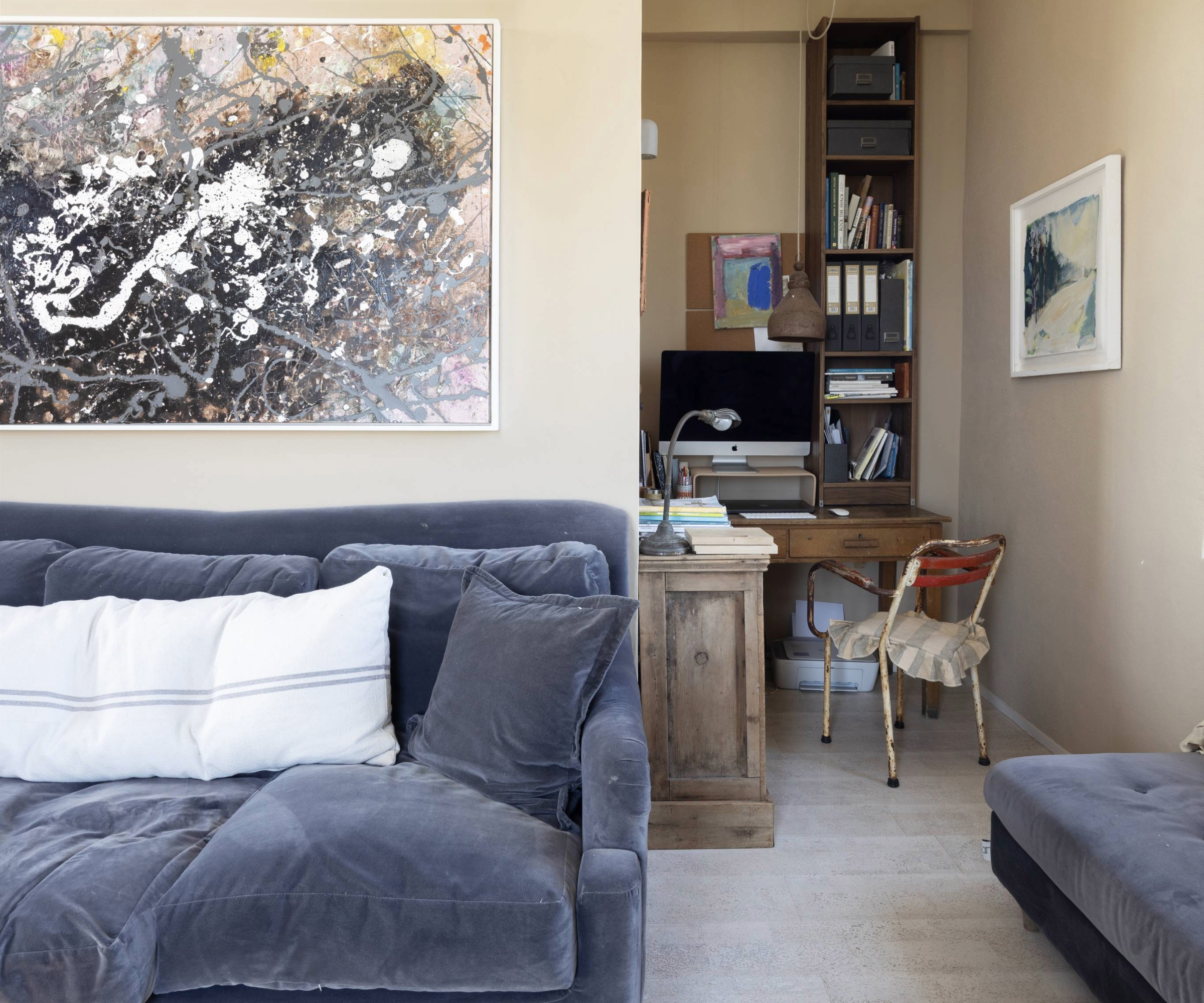 Living room with mini office area in alcove