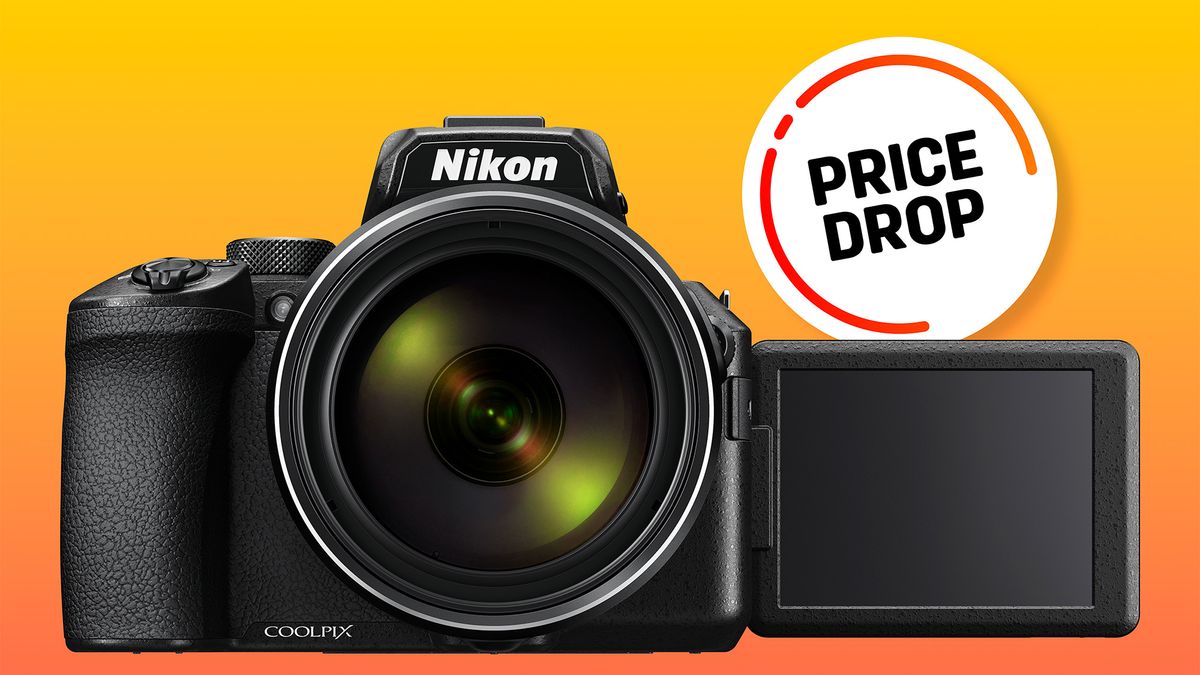 Nikon P950 with screen flipped out on a red and orange background with a Price Drop roundel 