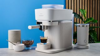 the philips baristina photographed against the blue tom's guide background