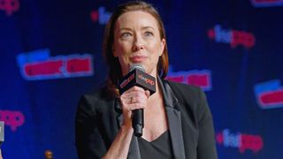 Actor Molly Parker, who plays the Robinson family matriarch Maureen, addresses an audience at the 2019 New York Comic Con during a panel about the second season of the Netflix series "Lost in Space."