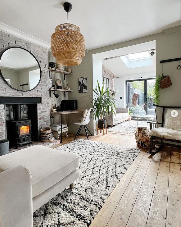 A living room with view out into the garden