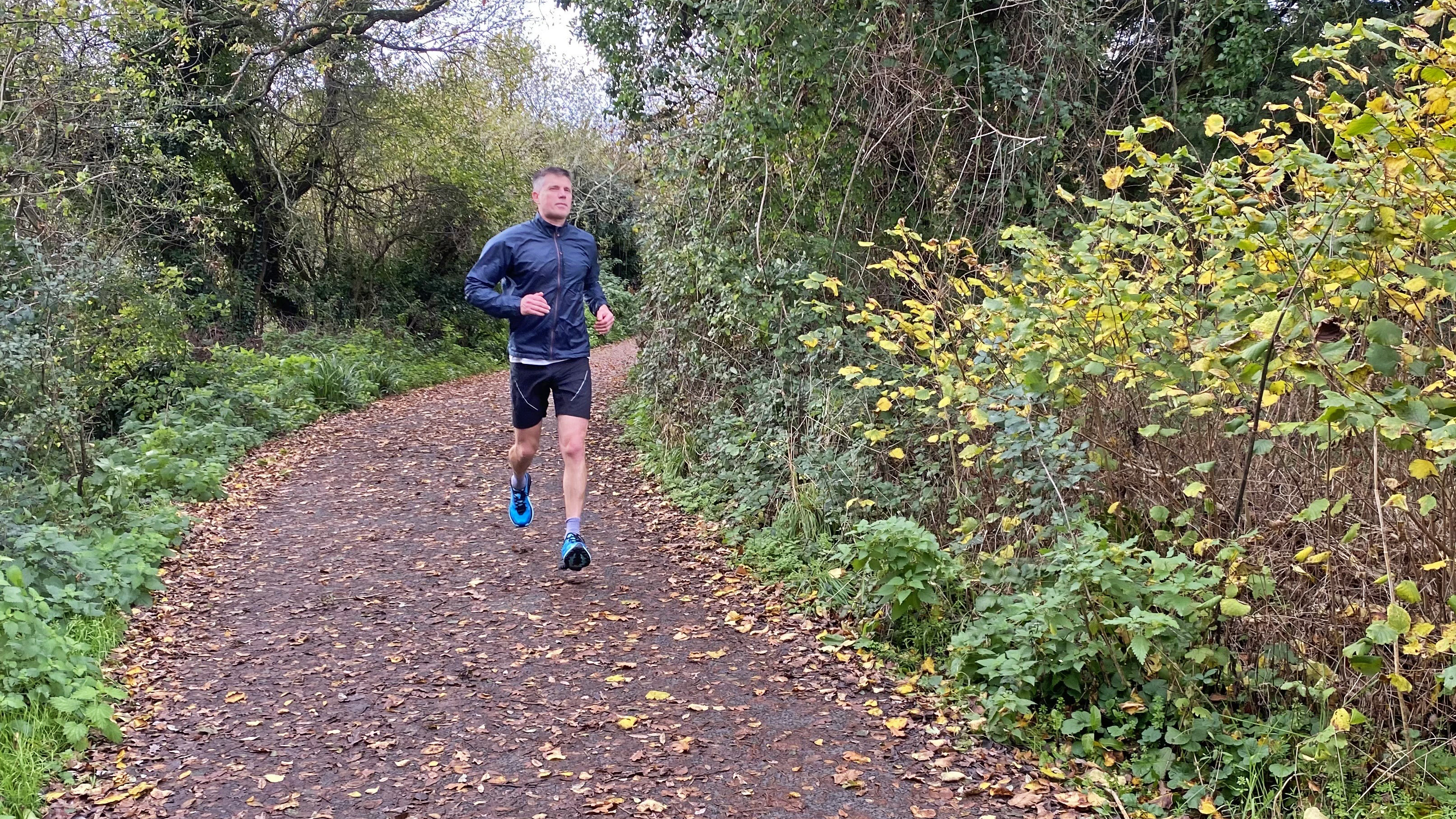 Man running in the Hoka Mafate 5