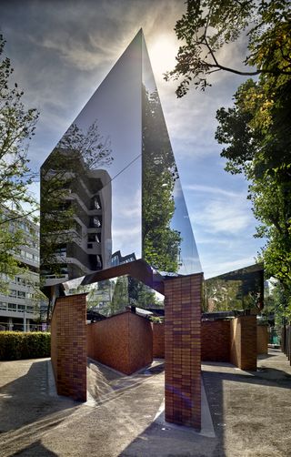 dramatic geometries at Studio Libeskind's National Holocaust Memorial of Names in Amsterdam