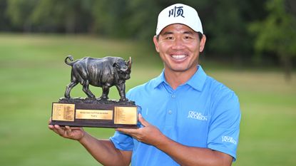 Ashun Wu with the trophy after winning the 2022 Magical Kenya Open